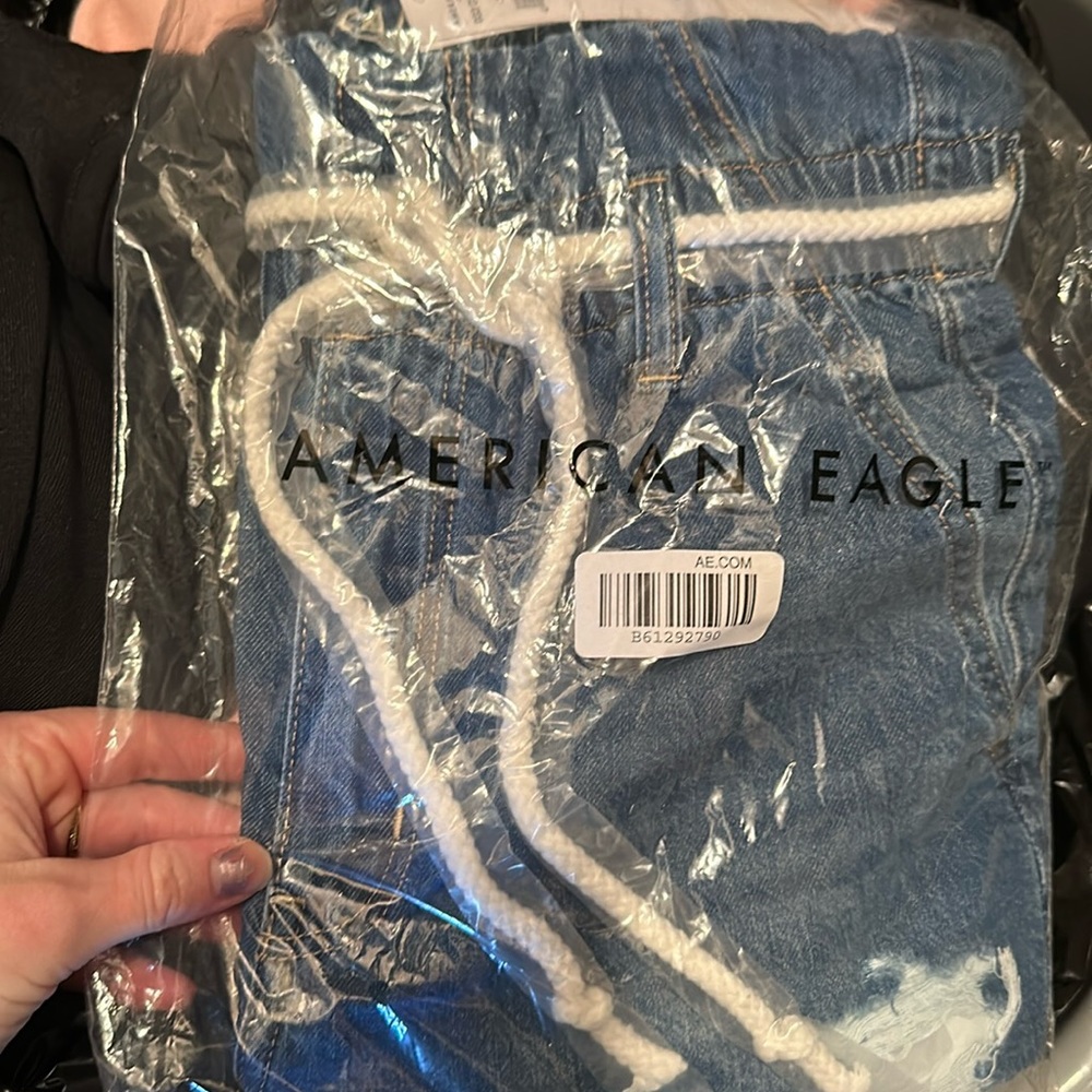 American Eagle HR Jean shorts with white tie